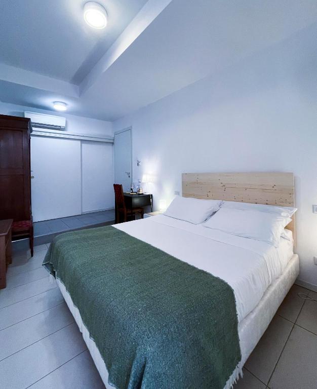 Postel nebo postele na pokoji v ubytování B&B Ponte Manin