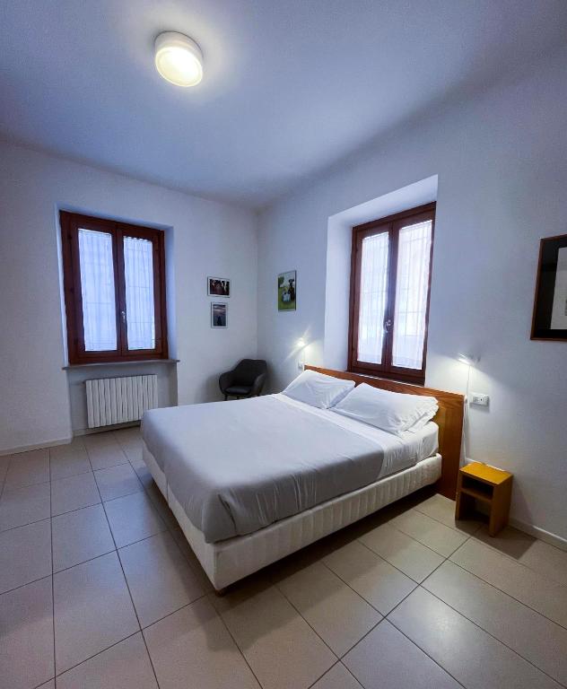 Postel nebo postele na pokoji v ubytování B&B Ponte Manin