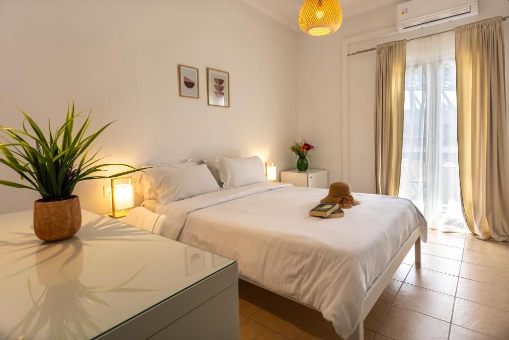 Postel nebo postele na pokoji v ubytování Hotel Bretagne