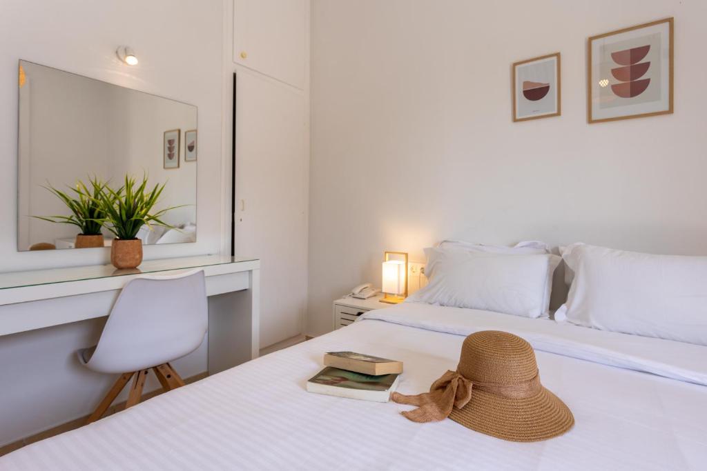 Postel nebo postele na pokoji v ubytování Hotel Bretagne
