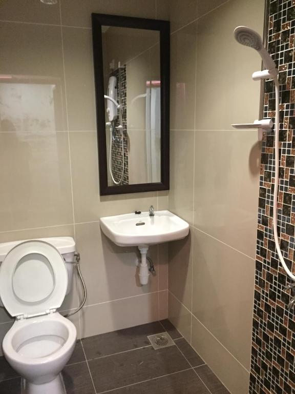 Koupelna v ubytování Tas Sakura Budget Hotel