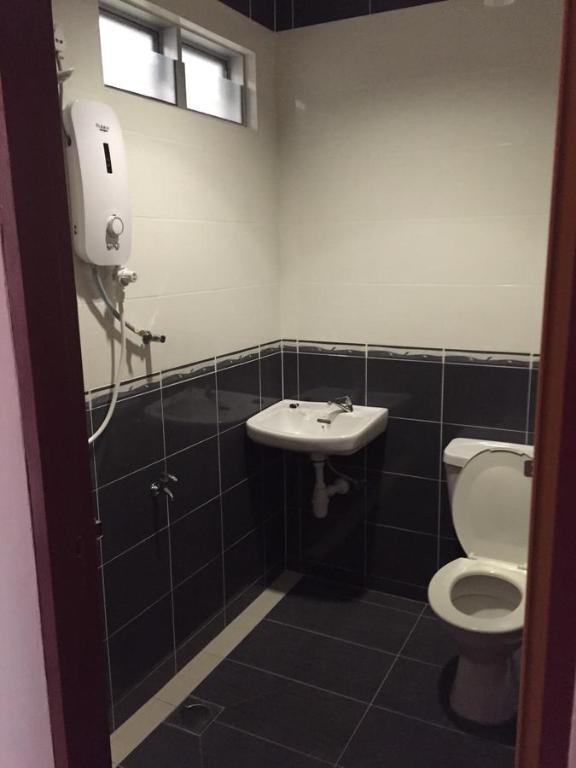 Koupelna v ubytování Tas Sakura Budget Hotel