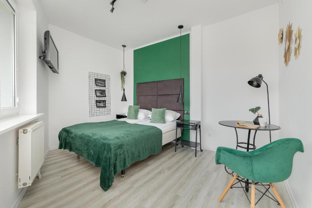 Posteľ alebo postele v izbe v ubytovaní Etna Apartments Kołobrzeg by Noclegi Renters