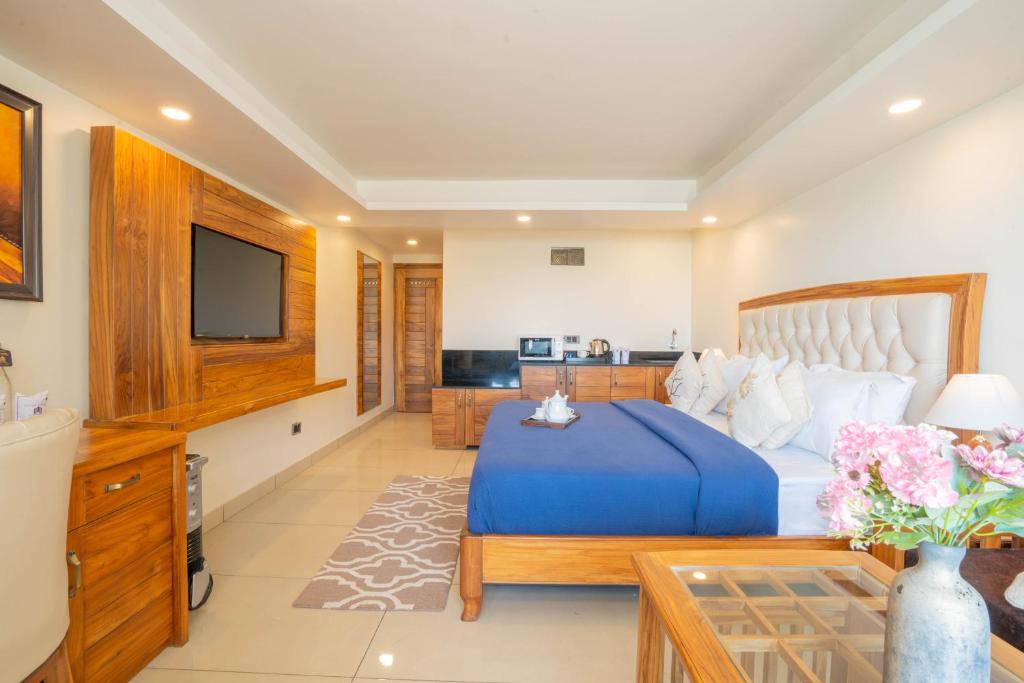 Posezení v ubytování Perfectstayz Mokshada Suites