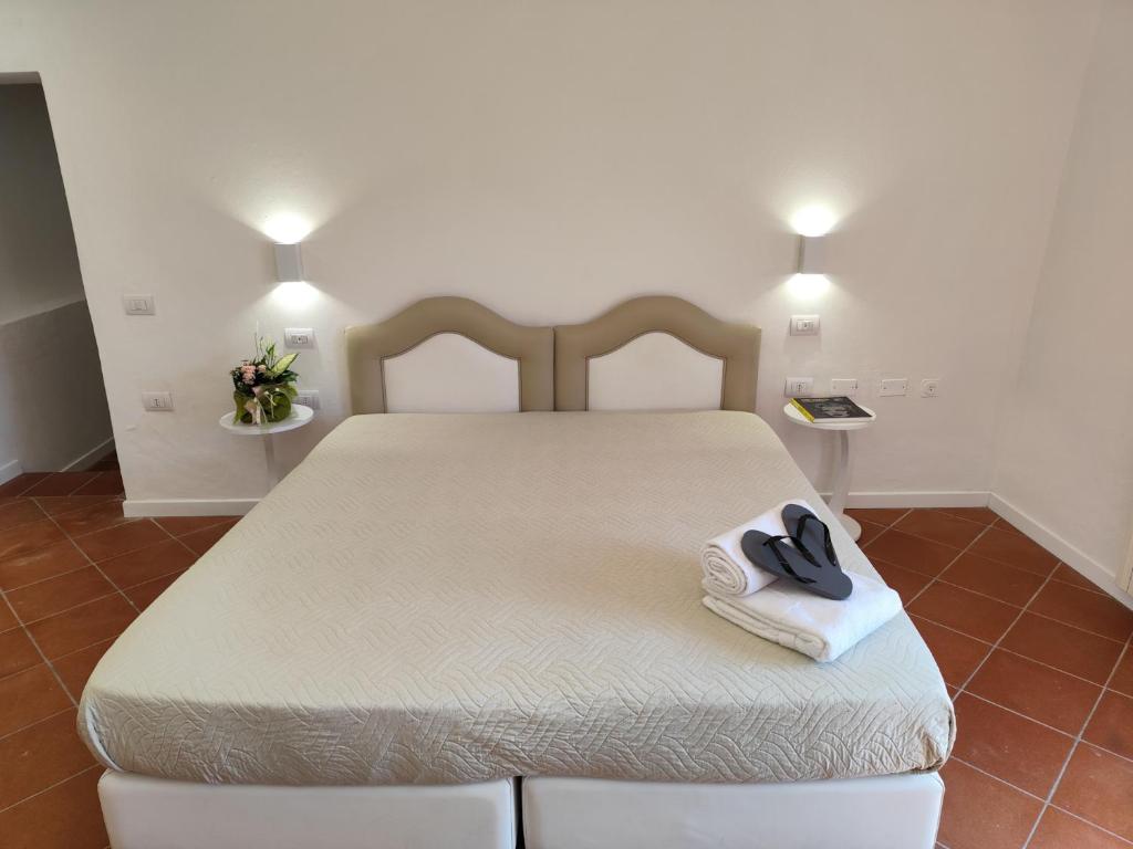 Łóżko lub łóżka w pokoju w obiekcie Agriturismo - Collina Toscana Resort