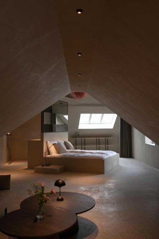 Postel nebo postele na pokoji v ubytování Luxe in Het Posthuis - nieuwe Stijlvolle Verblijven in Oud-Rekem