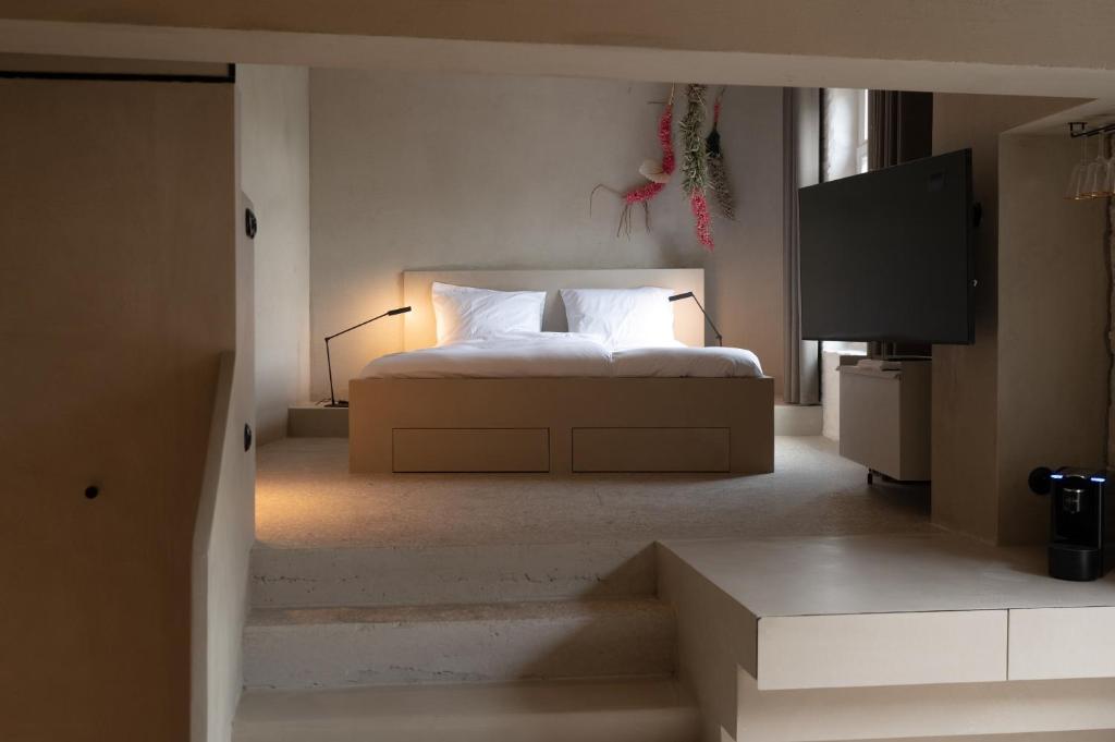 Postel nebo postele na pokoji v ubytování Luxe in Het Posthuis - nieuwe Stijlvolle Verblijven in Oud-Rekem