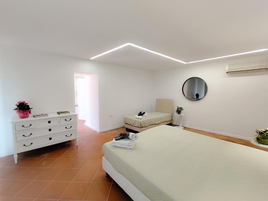 Łóżko lub łóżka w pokoju w obiekcie Agriturismo - Collina Toscana Resort