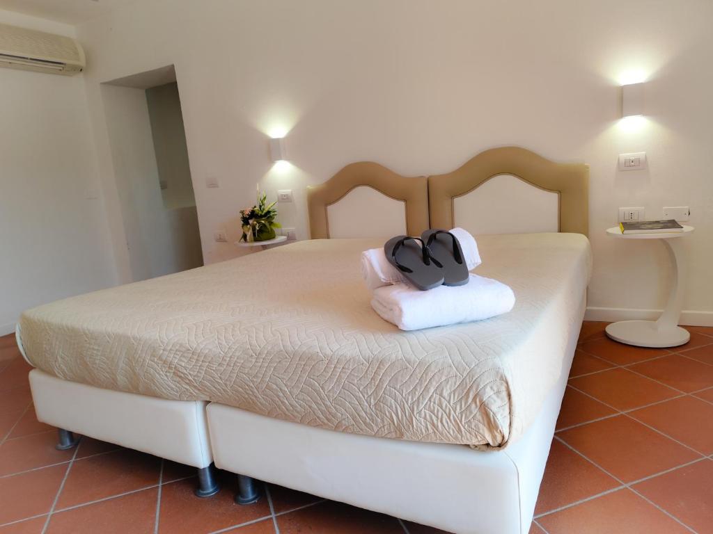 Łóżko lub łóżka w pokoju w obiekcie Agriturismo - Collina Toscana Resort