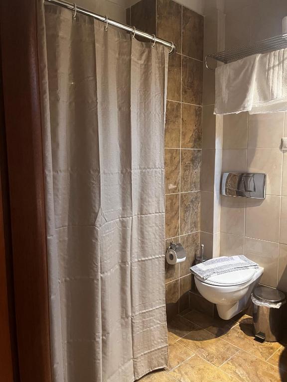 Koupelna v ubytování Evia Hotel & Suites