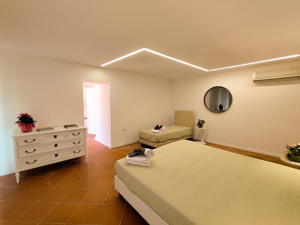 Łóżko lub łóżka w pokoju w obiekcie Agriturismo - Collina Toscana Resort
