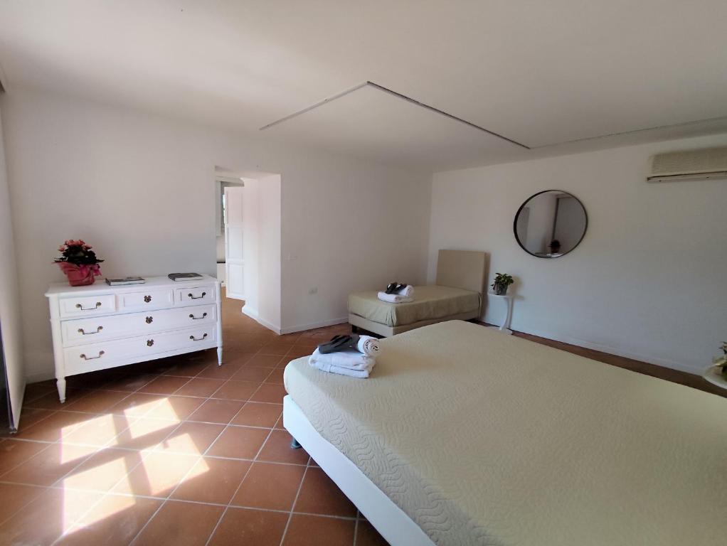 Łóżko lub łóżka w pokoju w obiekcie Agriturismo - Collina Toscana Resort