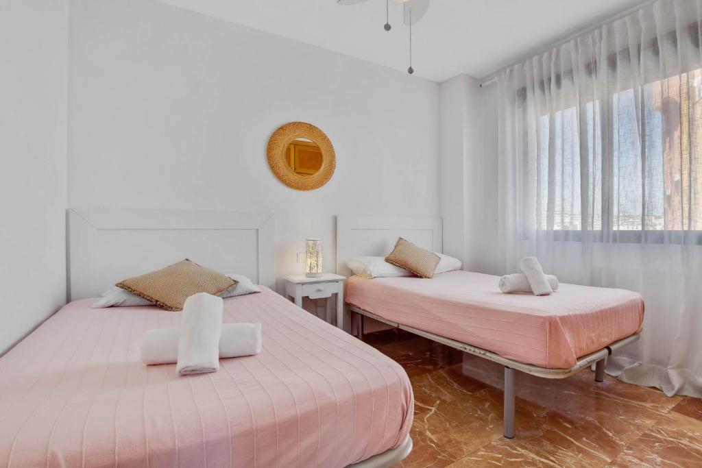 A bed or beds in a room at Fontana 5D by IVI Real Estate