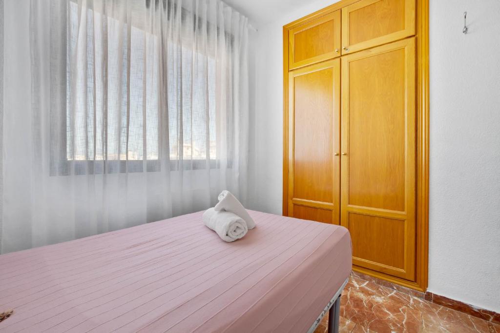 A bed or beds in a room at Fontana 5D by IVI Real Estate