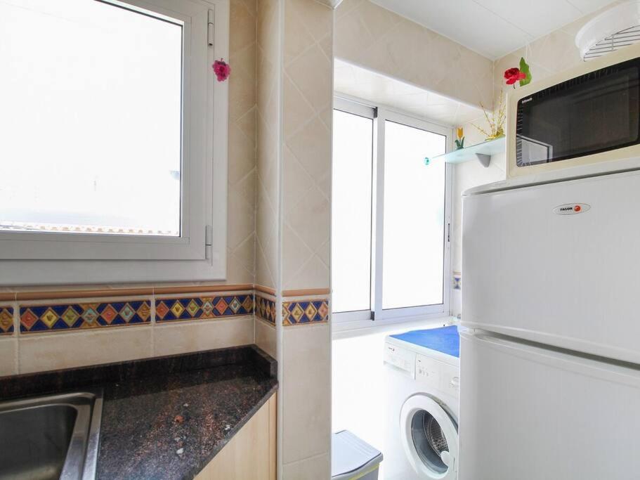 Kuchyň nebo kuchyňský kout v ubytování Apartment Mila