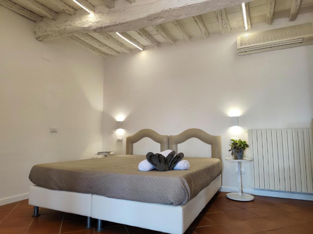 Łóżko lub łóżka w pokoju w obiekcie Agriturismo - Collina Toscana Resort