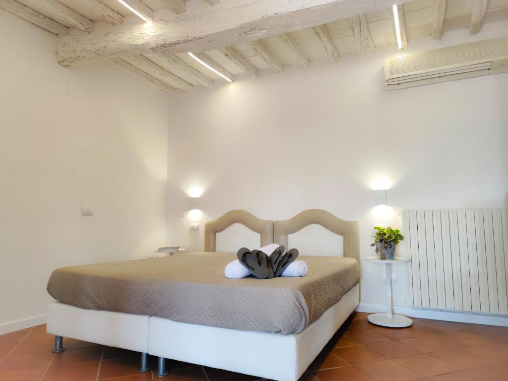 Łóżko lub łóżka w pokoju w obiekcie Agriturismo - Collina Toscana Resort