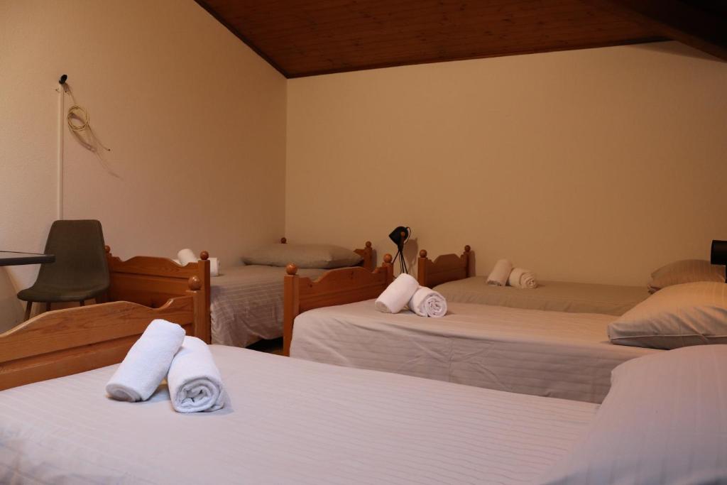 Postel nebo postele na pokoji v ubytování Borgovecchio Albergo