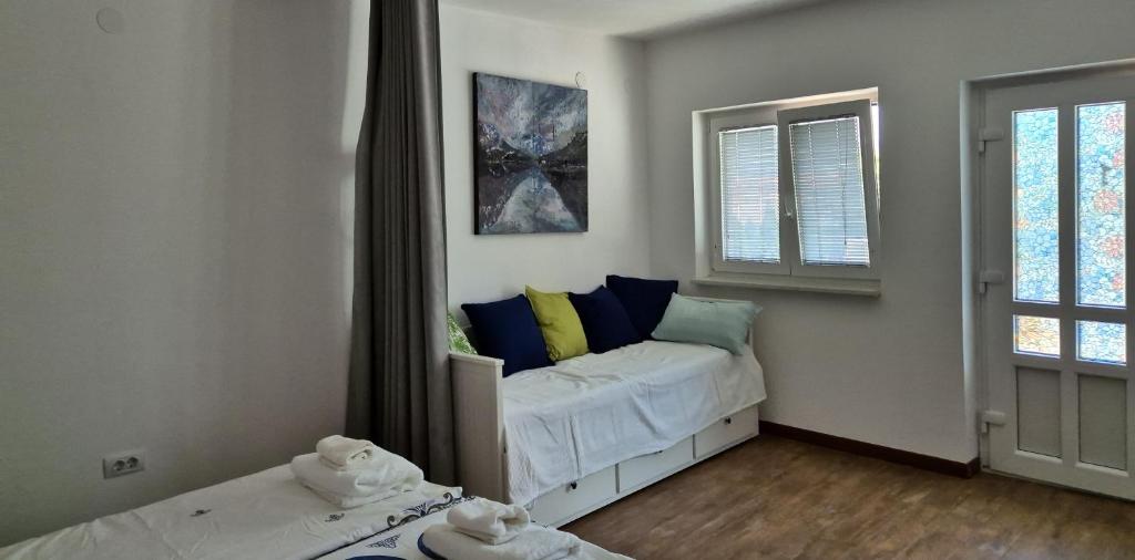 Postel nebo postele na pokoji v ubytování Nortra apartment