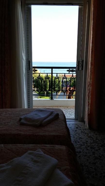 Ein Bett oder Betten in einem Zimmer der Unterkunft Anetis Hotel