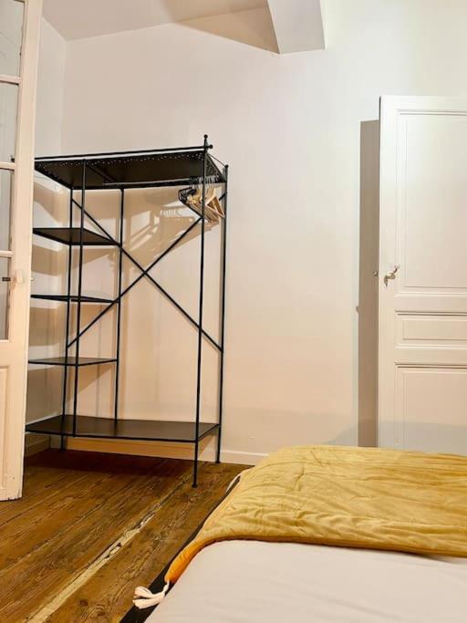 Postel nebo postele na pokoji v ubytování Appartement Victor Hugo - balcon
