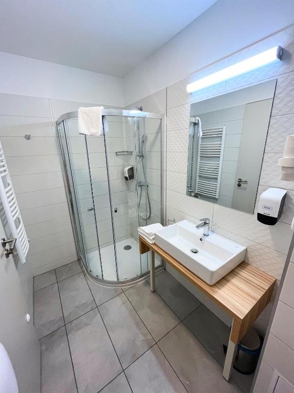 Koupelna v ubytování Aqua Hotel