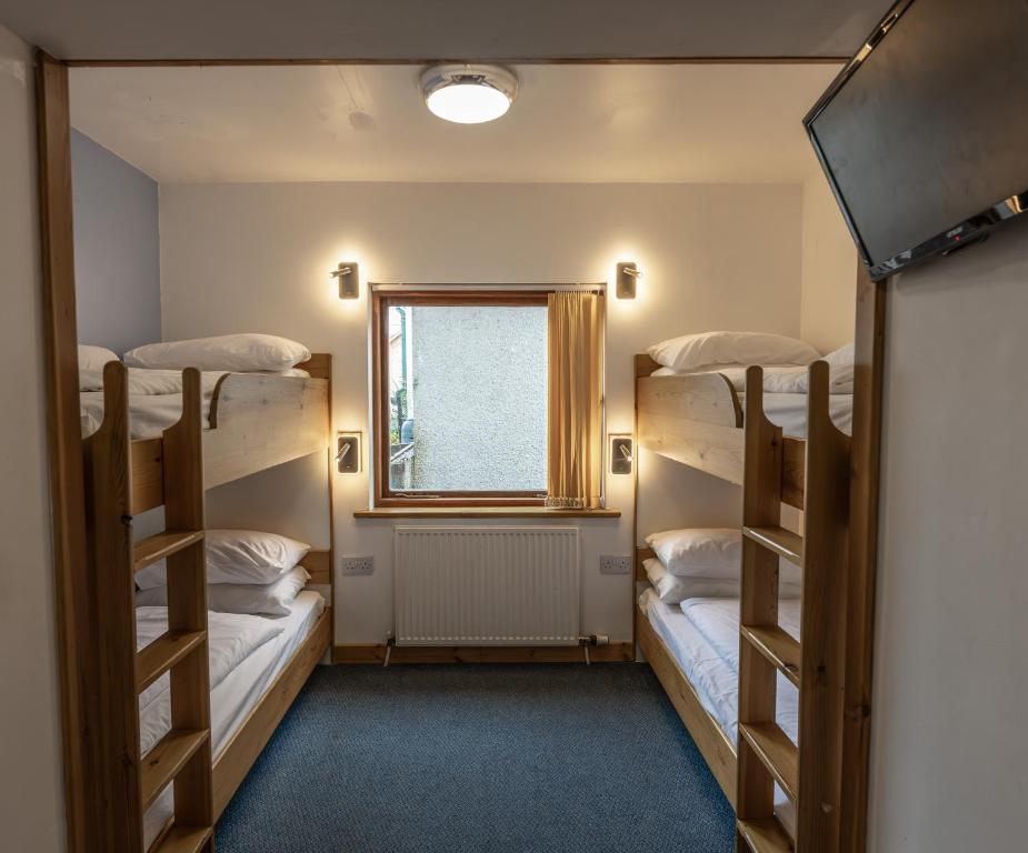Postel nebo postele na pokoji v ubytování Insh Hall