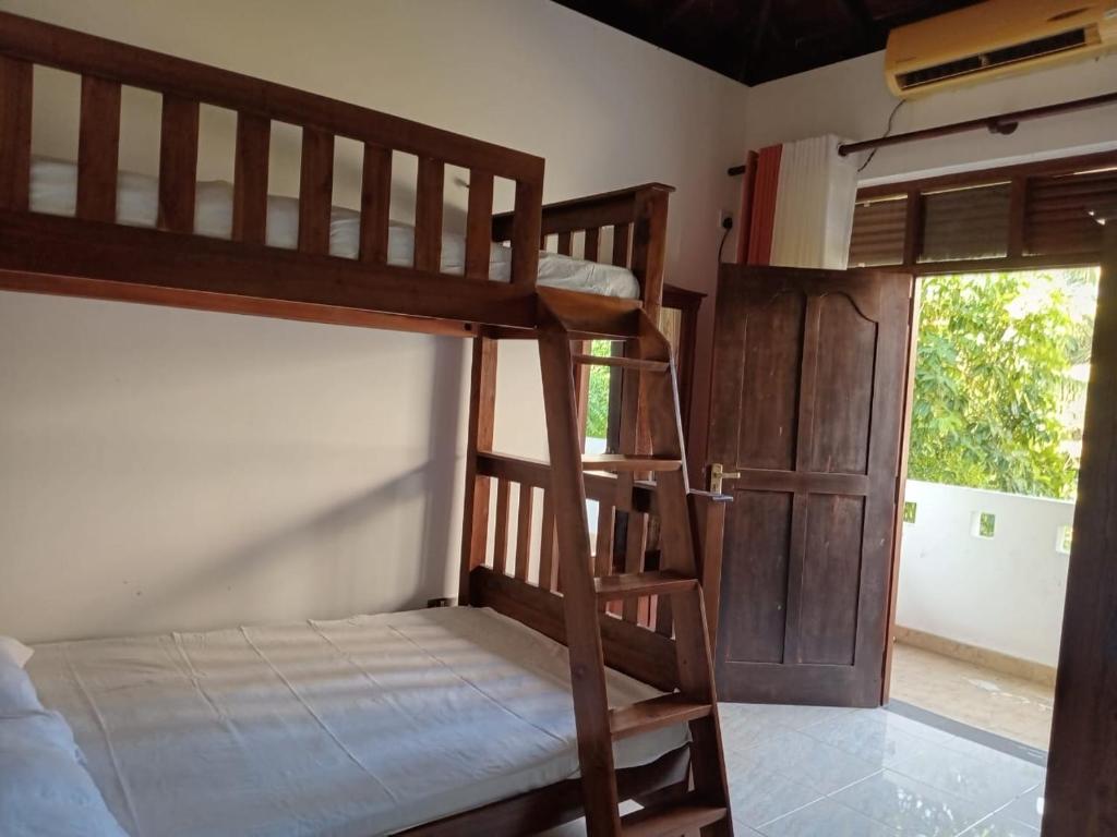 Krevet ili kreveti na kat u jedinici u objektu Jayawardana House