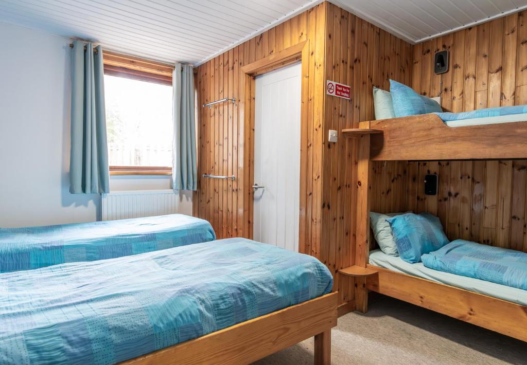 Postel nebo postele na pokoji v ubytování Insh Hall