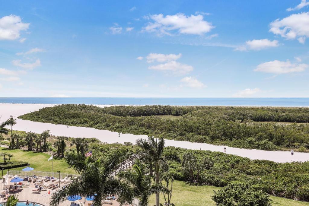 an aerial view of the beach and the ocean at South Seas Tower 4-704 in Marco Island