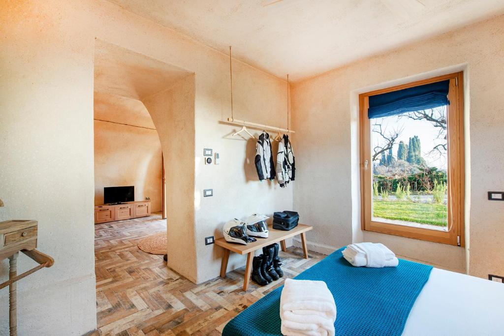 Katil atau katil-katil dalam bilik di Agriturismo GaiaSofia - adults only