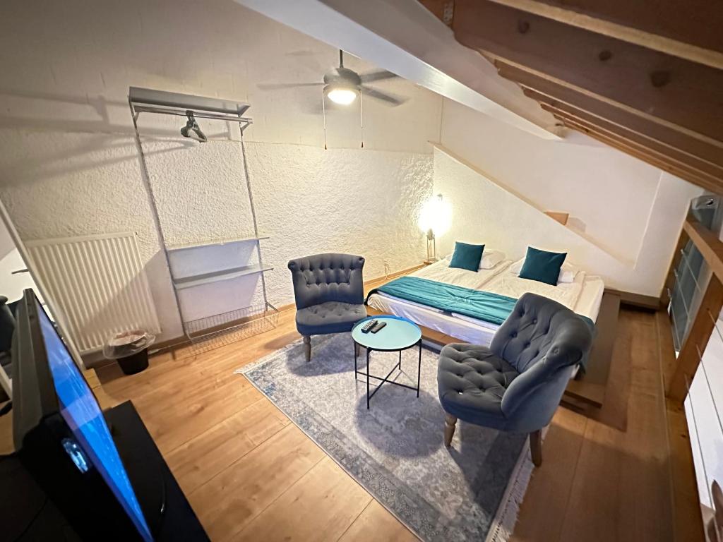 Postel nebo postele na pokoji v ubytování Chez Alain Prévu - Boutique Hotel by Stay Swiss