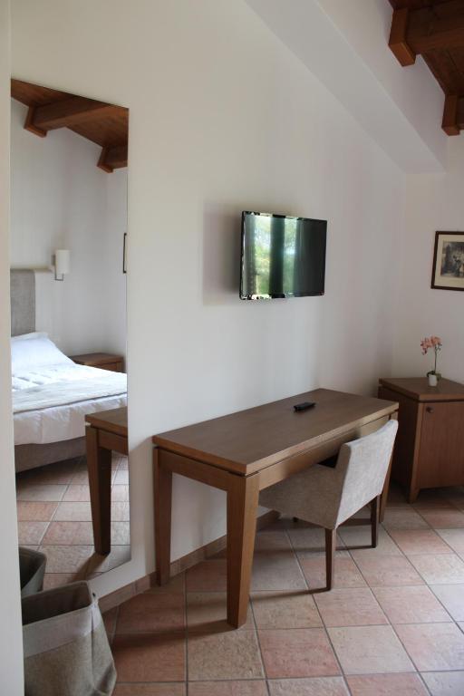Postel nebo postele na pokoji v ubytování Masseria Pietrafitta