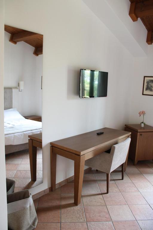 Postel nebo postele na pokoji v ubytování Masseria Pietrafitta