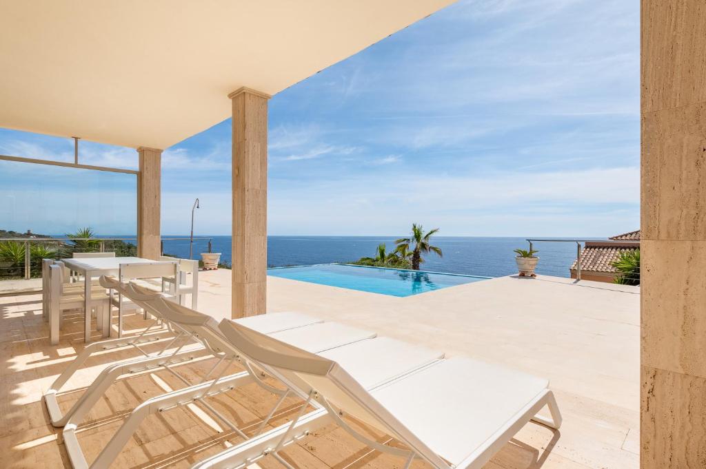 a house with a view of the ocean at Vista Mar by Mallorca House Rent in Manacor