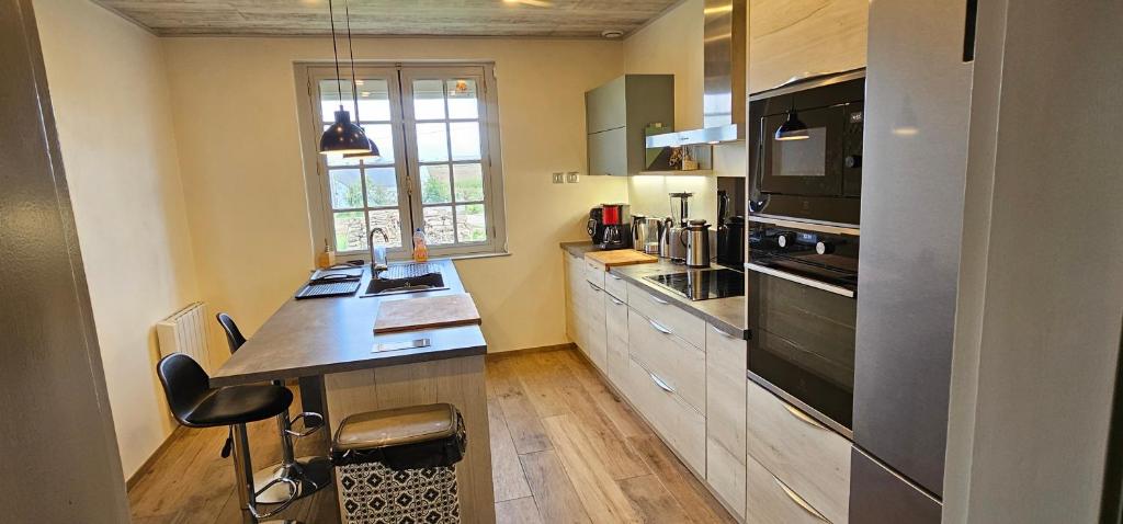 A cozinha ou cozinha compacta de Chez Ren&eacute;e et Raynal B&amp;B