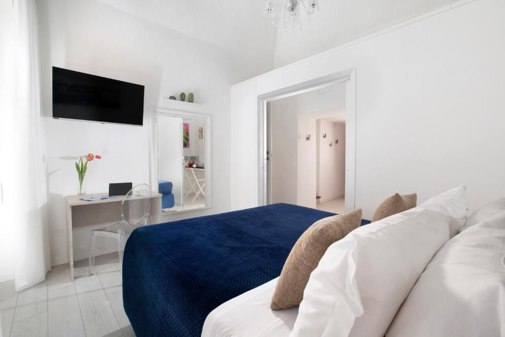 Postel nebo postele na pokoji v ubytování YourHome - Jolly Aranci