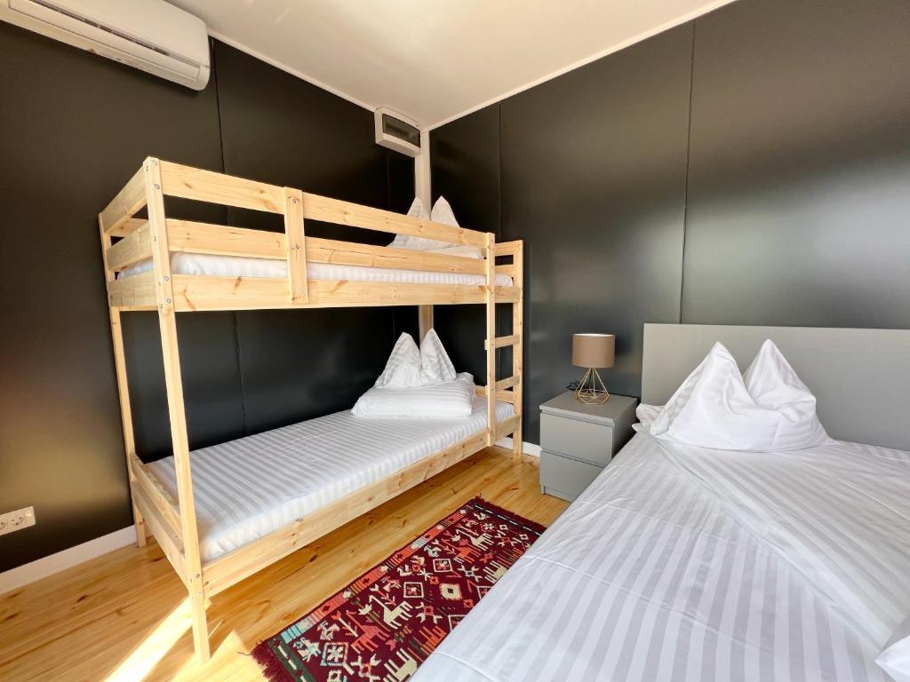 Postel nebo postele na pokoji v ubytování FLANDRA Glamping