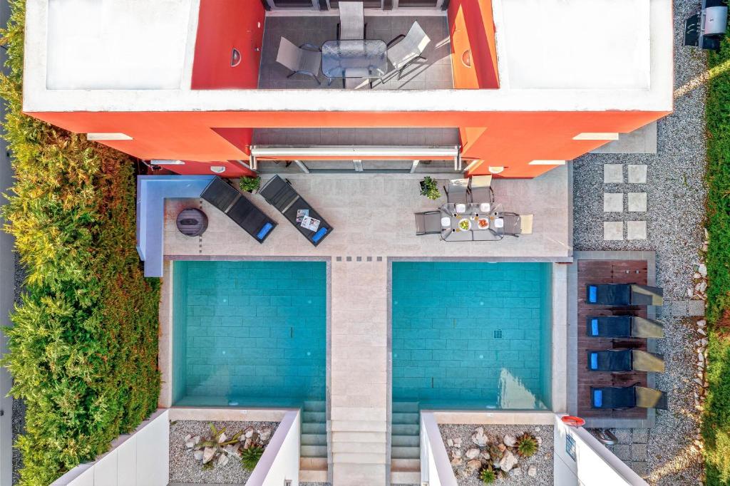 The swimming pool at or close to Almond Villa