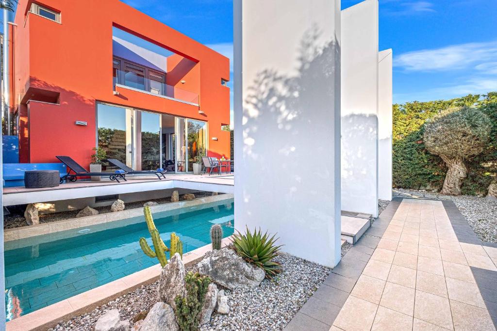 The swimming pool at or close to Almond Villa