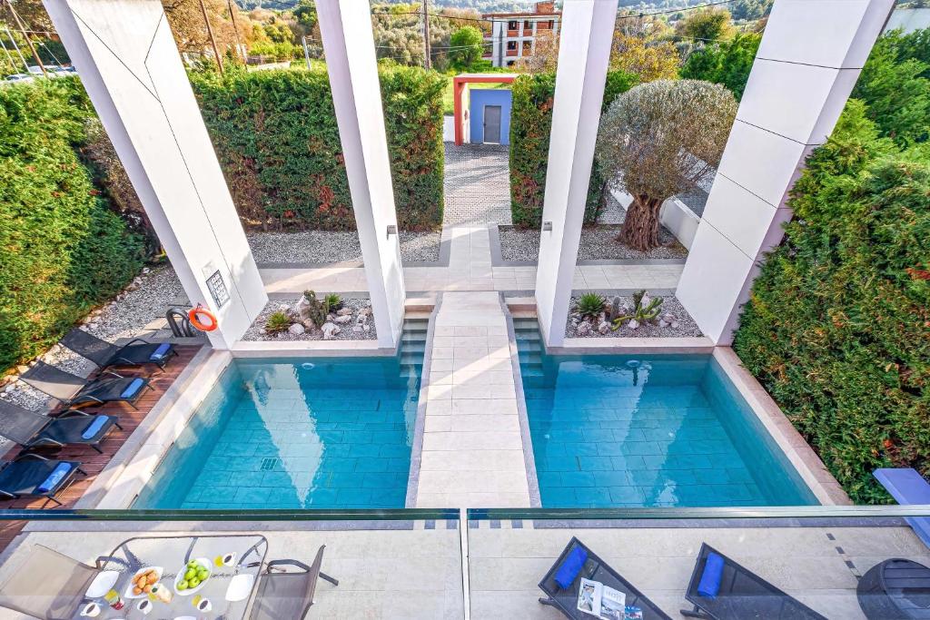 The swimming pool at or close to Almond Villa