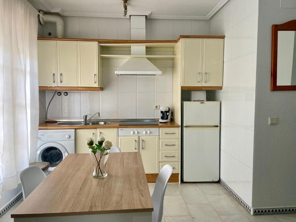 Kuchyň nebo kuchyňský kout v ubytování Apartamento Columela