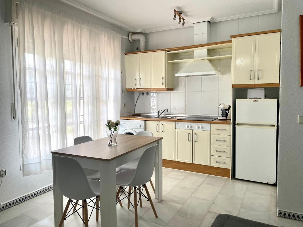 Kuchyň nebo kuchyňský kout v ubytování Apartamento Columela