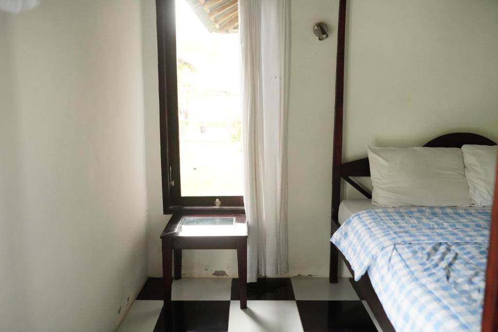 Postel nebo postele na pokoji v ubytování Bali Strawberry Glamping and Camp Bedugul