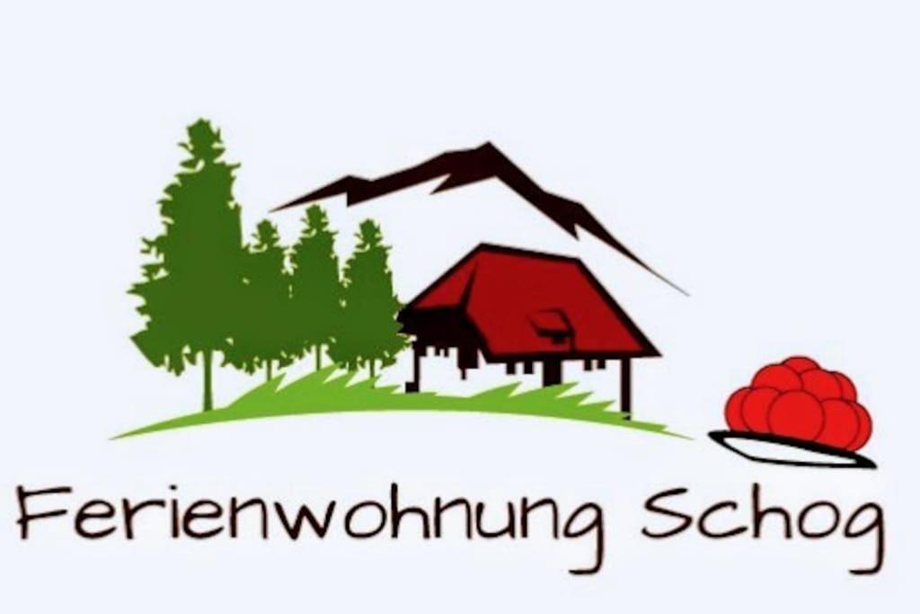 uma ave a sobrevoar o logótipo de uma escola agrícola em Ferienwohnung Schog em Todtnau