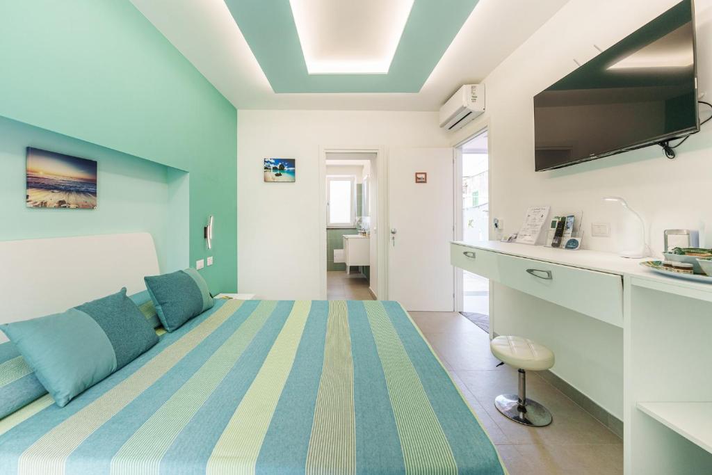 TV a/nebo společenská místnost v ubytování Le Rondinelle Rooms