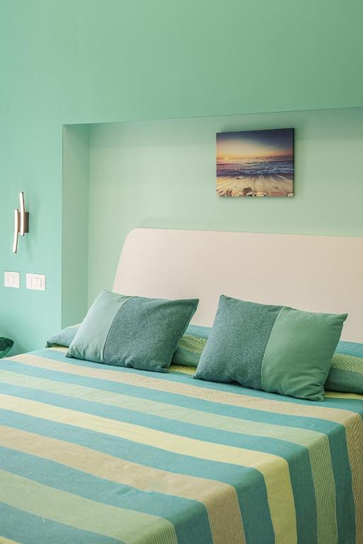 Postel nebo postele na pokoji v ubytování Le Rondinelle Rooms