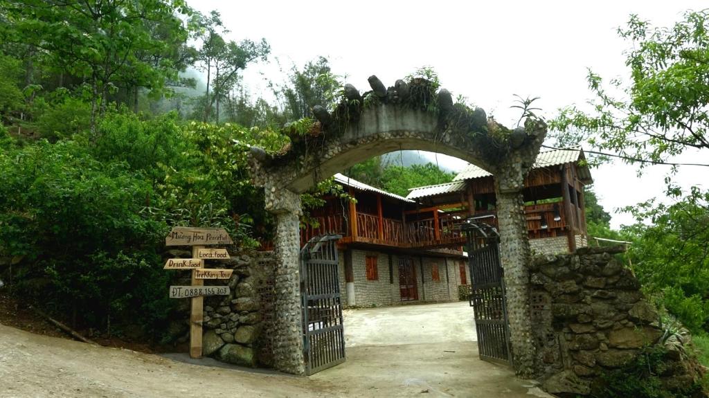 a building with a gate in front of it at MUONG HOA Peaceful HOMESTAY & Sapa in Lao Cai