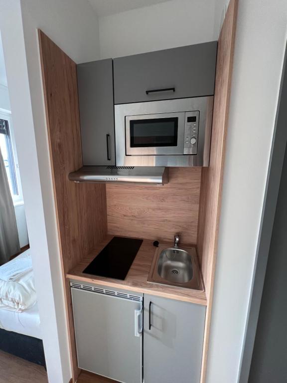 Kuchyň nebo kuchyňský kout v ubytování Firstsleep Ebersberg