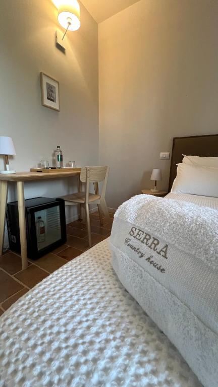 Posteľ alebo postele v izbe v ubytovaní Serra Country House
